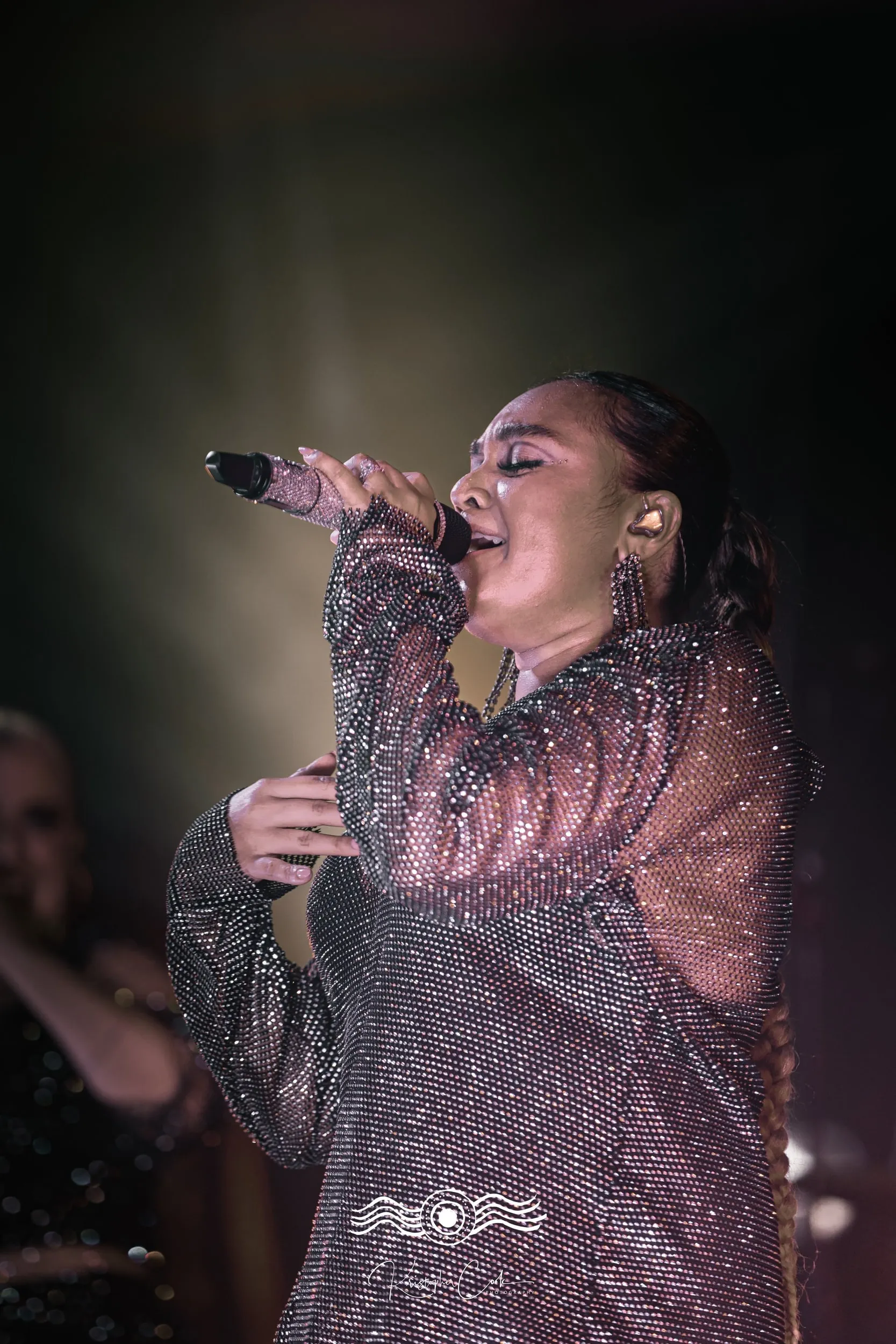 Singer in glitter at Groove on the Grass, Grafton, 2023, photographed by Kris Cook