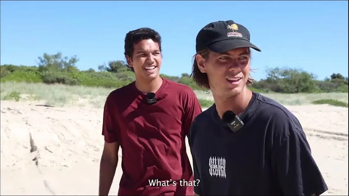 Malachi and Jalurah walking on the beach and talking in language, from Kris Cook's video Our Ngurra